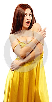 Frightened woman in yellow dress