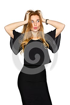 Frightened young woman on an isolated white background