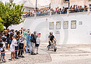 FRIGILIANA, SPAIN - MAY 13, 2018 `Autos Locos` - traditional fun involving the ride of cardboard cars in small spanish town