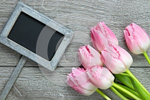 Fringed fancy frills tulips on wooden background