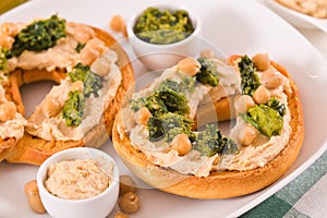 Friselle with turnip tops and hummus.