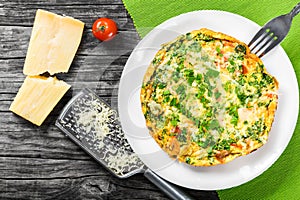 Frittata with deviled eggs, ricotta, onion, tomatoes and bell peppers