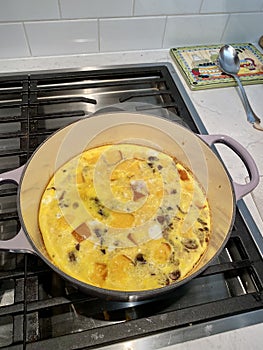 Frittata with mushrooms in a dutch oven pan