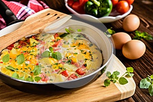 Frittata with potato, cheese and pepper