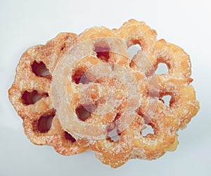 Fritter dusted with sugar also called `buÃÂ±uelos` photo