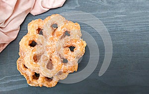 Fritter dusted with sugar `buÃÂ±uelos` photo