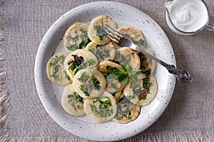 Fritters with green parsley, dill, lettuce