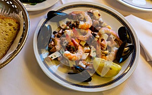 Frittura di mare - plate with various seafood. Italian food photo