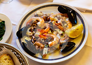 Frittura di mare - plate with various seafood. Italian food photo