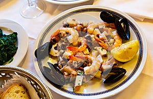 Frittura di mare - plate with various seafood. Italian food photo