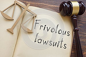 Frivolous lawsuits are shown on the photo using the text photo