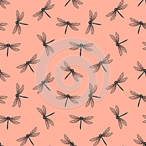 Frivolous print with dragonfly on pink background photo