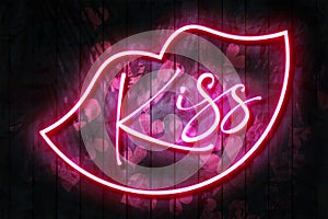 Kiss neon sign with neon lips on a dark wooden wall, 3D illustration with red heart background