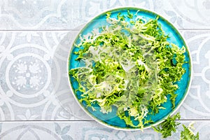 Frize lettuce salad, fresh frisee