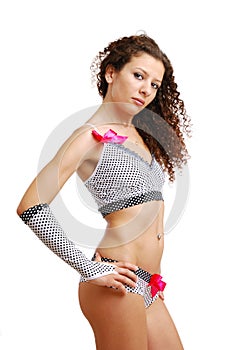 Frizzy girl in polka dot erotic clothes with bows