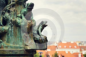 Frog splashing water on fountain, water scarcity concept, Petrin, Prague