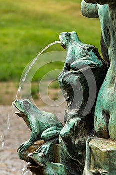 Frog splashing water on fountain, water scarcity concept, Petrin, Prague