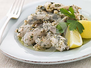 Frogs Legs Fried in Garlic and Herb Butter