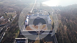Front aerial view of the Vyshnivets Palace, Ukraine, in autumn. Picturesquere therritory.
