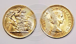 Front and back side of One british pound sterling gold, old type, 1964