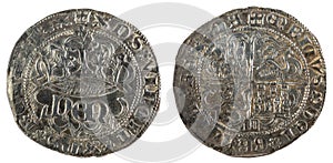 Front and backside of a historic medieval silver coin of the King Enrique IV photo