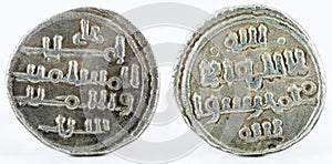 Front and backside of a historic Spanish silver coin of Almoravids