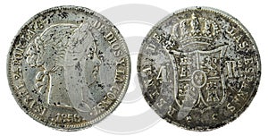 Front and backside of a historic Spanish silver coin of Queen Isabel II from 1858