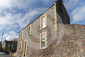 Front of a building with stone exterial