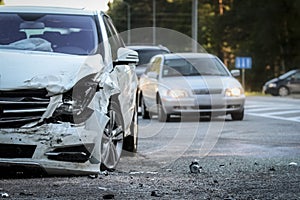 Front of a car get damaged by crash accident on the road