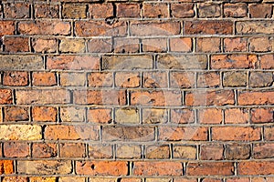 Front close-up view of a old brick wall - Image
