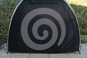 Closed Black Bicycle Tent with Zipper Closure, Outdoor photo