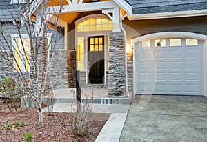 Front covered porch design with stone columns