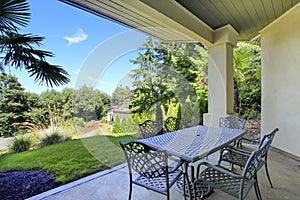 Front covered porch interior of new luxury home.