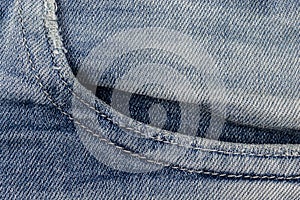 Front crumpled threadbare pocket oÐ° blue jeans