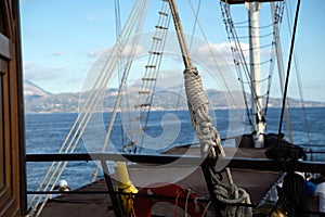 Front deck of a sailing ship with ropes, mooring lines and tow lines