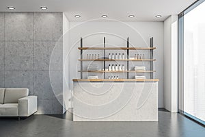 Front desk with bathware at the white wall