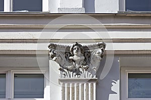 Front detail showing a pilaster capital and face