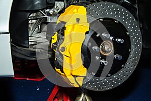 Front Disk brake on a modern car. Brake system show real