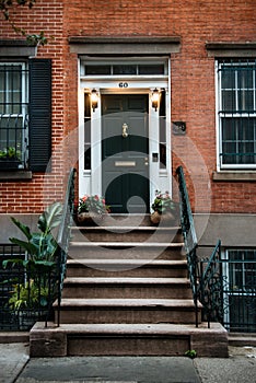 Front Door of a Beautiful Georgian Era English Manhattan Town House. New York City home building entrance