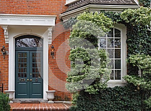 Front door of brick townhouse