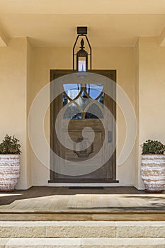 Front door with brown wood.