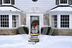 front door with Christmas wreath