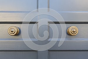 Front door, grey with knobs