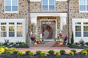 Front door, horizontal view of front door with seasonal decor