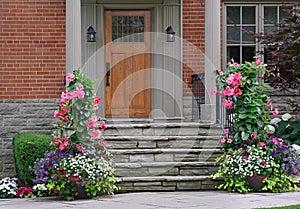 front door of house, surrounded by summer flowers