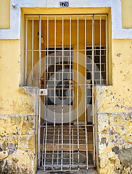 Front door of an old house in a neighborhood of Sao Paulo. Entrance gate of an ancient house in Sao Paulo city, Brazil.