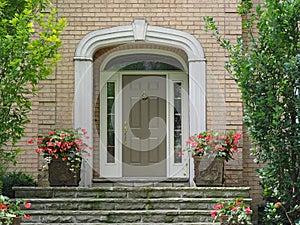 Front door with sidelights and transom window photo