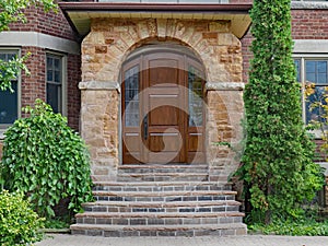 Front door with stone portico