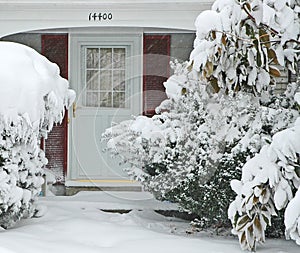 Front Door and Walkway In Big Snowstorm