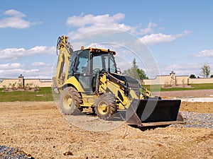 Front end loader at a construction site